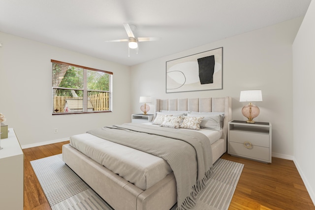 4155 NW 1st Ct, Delray Beach, FL 33445 - bedroom with baseboards, wood finished floors, and a ceiling fan
