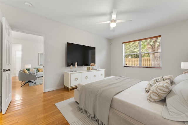 4155 NW 1st Ct, Delray Beach, FL 33445 - bedroom with light wood-style floors, a ceiling fan, and baseboards
