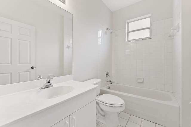 4155 NW 1st Ct, Delray Beach, FL 33445 - full bathroom featuring tile patterned flooring, toilet, shower / washtub combination, and vanity