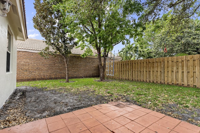 4155 NW 1st Ct, Delray Beach, FL 33445 - fenced backyard featuring a patio area