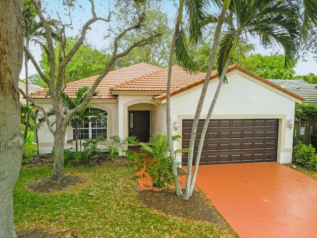 4155 NW 1st Ct, Delray Beach, FL 33445 - mediterranean / spanish home with stucco siding, a tile roof, an attached garage, and driveway
