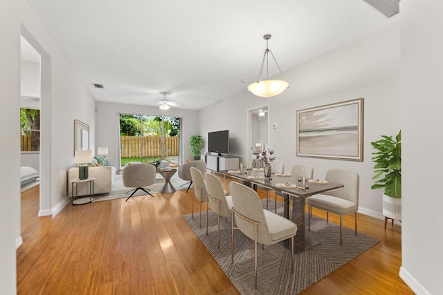 4155 NW 1st Ct, Delray Beach, FL 33445 - dining area with light wood-type flooring, baseboards, and ceiling fan