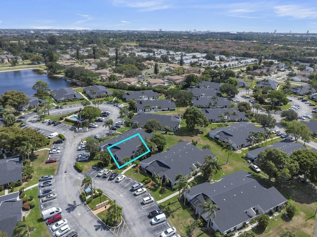 aerial view featuring a residential view and a water view