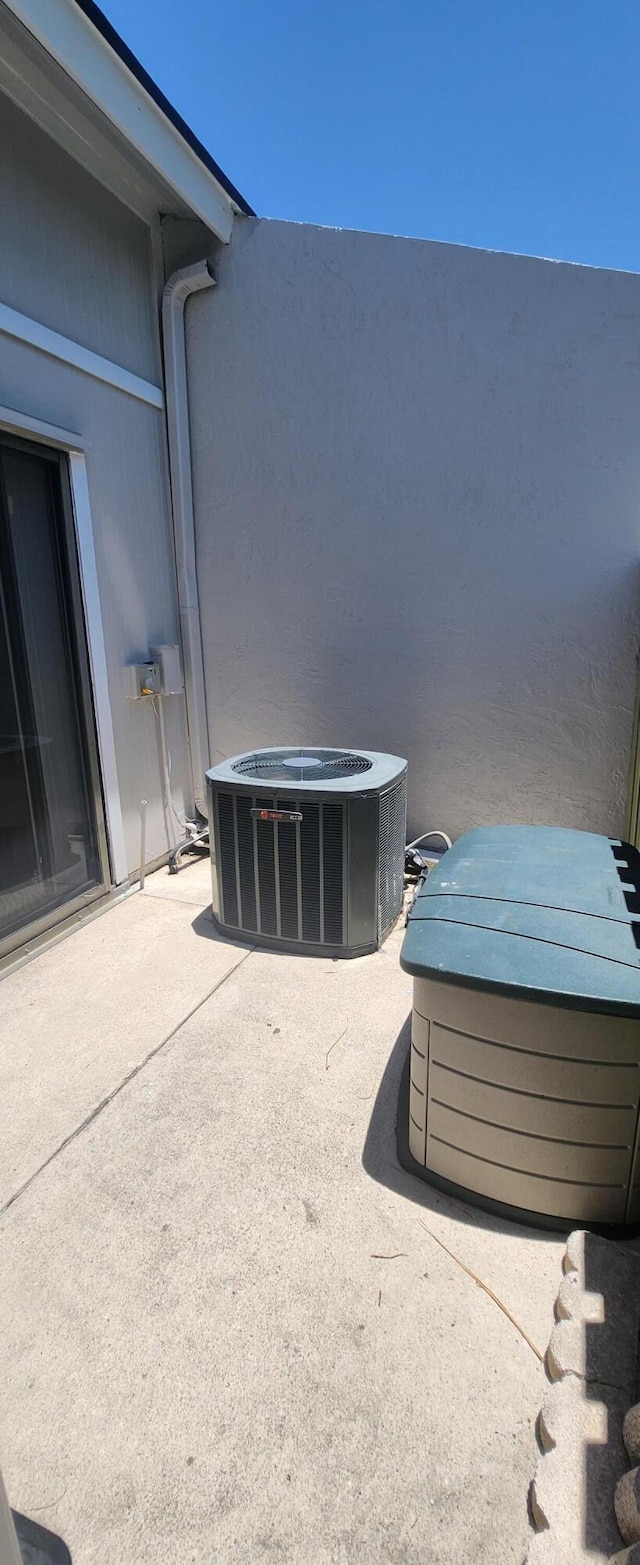 4389 Willow Pond Cir, West Palm Beach, FL 33417 - view of patio featuring central AC