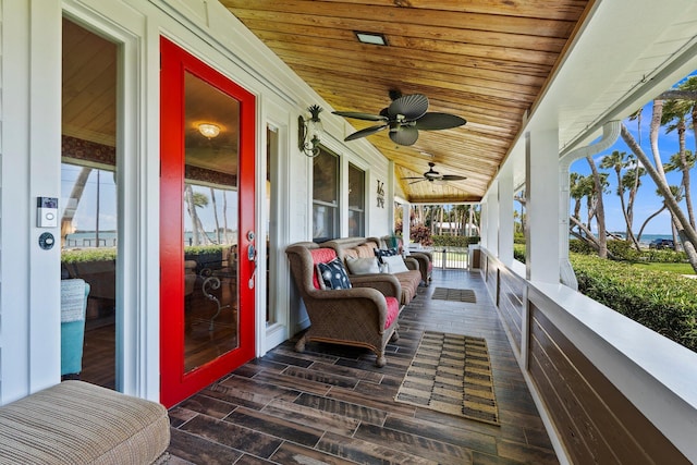 exterior space featuring ceiling fan
