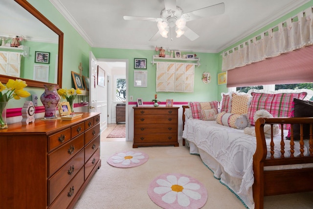 bedroom with a ceiling fan, light colored carpet, and ornamental molding