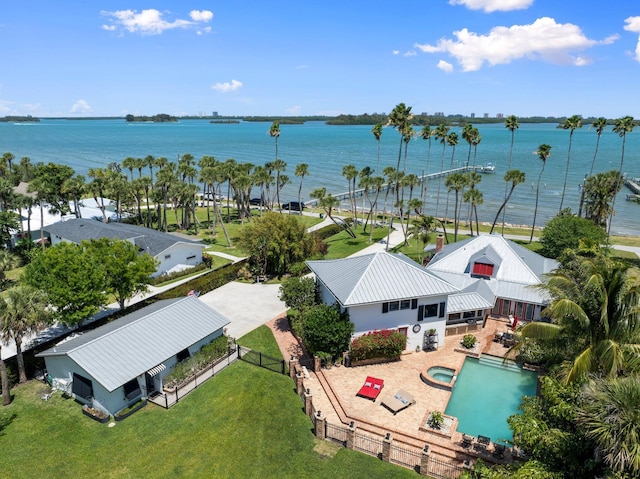 birds eye view of property featuring a water view