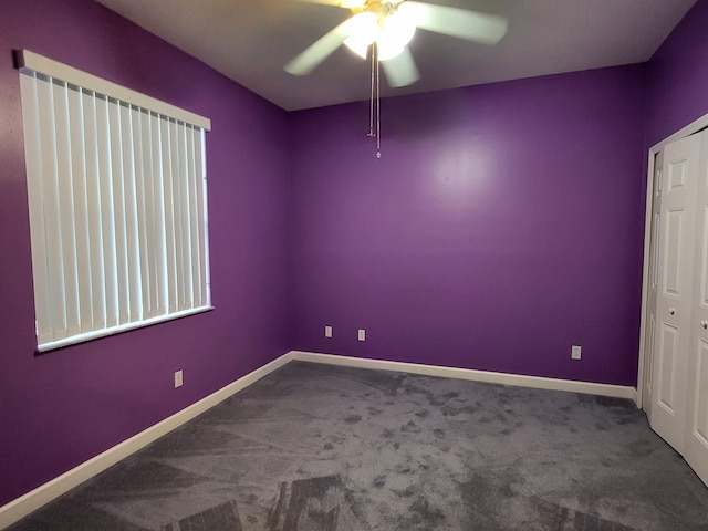 5105 E 1st Sq SW, Vero Beach, FL 32968 - spare room with carpet flooring, ceiling fan, and baseboards
