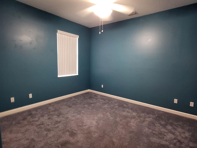 5105 E 1st Sq SW, Vero Beach, FL 32968 - unfurnished room with visible vents, a ceiling fan, baseboards, and carpet floors