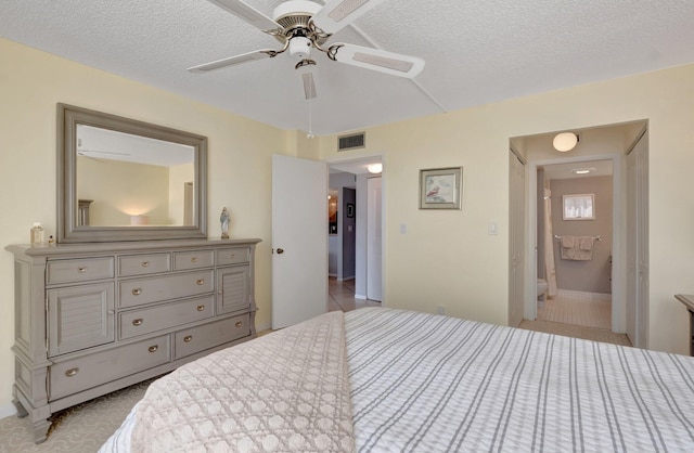 15 Royal Palm Way Unit 505, Boca Raton, FL 33432 - bedroom with ceiling fan, a textured ceiling, and visible vents