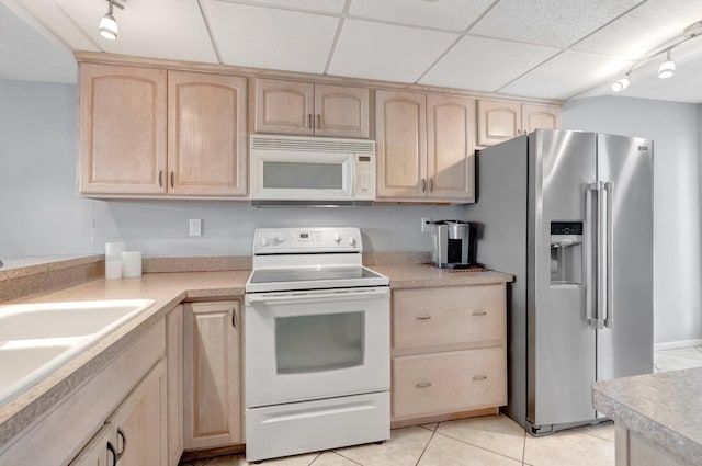 15 Royal Palm Way Unit 505, Boca Raton, FL 33432 - kitchen featuring light brown cabinetry, track lighting, white appliances, light countertops, and light tile patterned floors