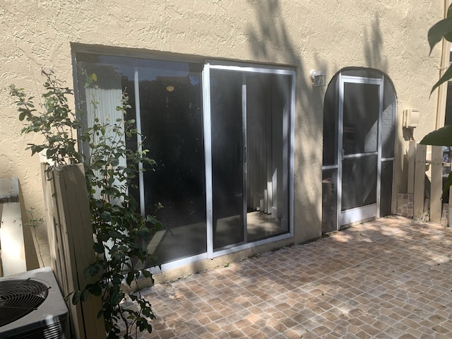 3342 Deer Creek Alba Way Unit 3342, Deerfield Beach, FL 33442 - view of patio / terrace featuring cooling unit