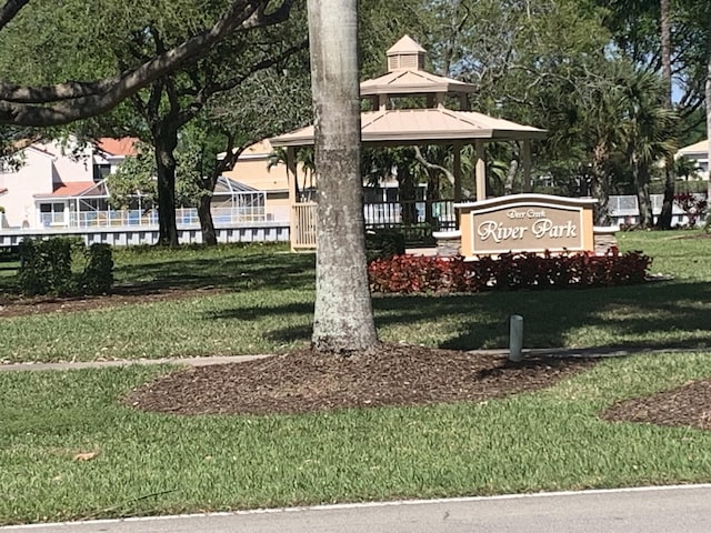 3342 Deer Creek Alba Way Unit 3342, Deerfield Beach, FL 33442 - community / neighborhood sign featuring a lawn