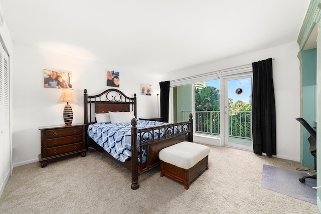 4301 N Ocean Blvd Unit 203, Boca Raton, FL 33431 - carpeted bedroom featuring baseboards and access to outside