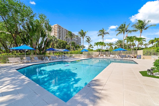 4301 N Ocean Blvd Unit 203, Boca Raton, FL 33431 - community pool with fence and a patio area