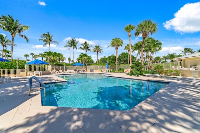 4301 N Ocean Blvd Unit 203, Boca Raton, FL 33431 - pool with fence and a patio area