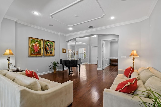 869 SW Habitat Ln, Palm City, FL 34990 - living area featuring arched walkways, crown molding, ornate columns, hardwood / wood-style floors, and baseboards