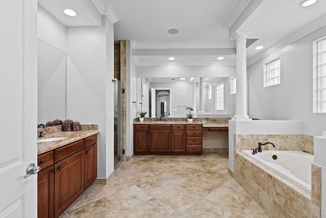 869 SW Habitat Ln, Palm City, FL 34990 - full bath with ornate columns, a shower stall, two vanities, ornamental molding, and a bath