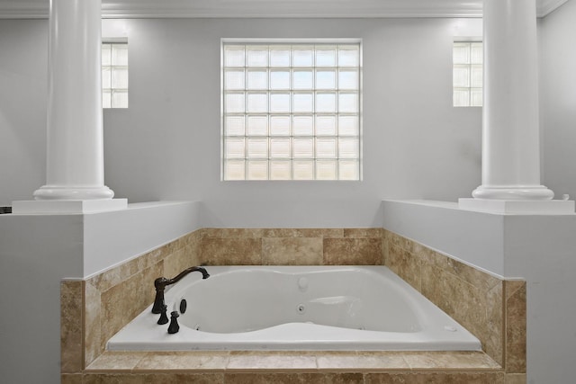 869 SW Habitat Ln, Palm City, FL 34990 - full bath featuring ornate columns, a jetted tub, and ornamental molding