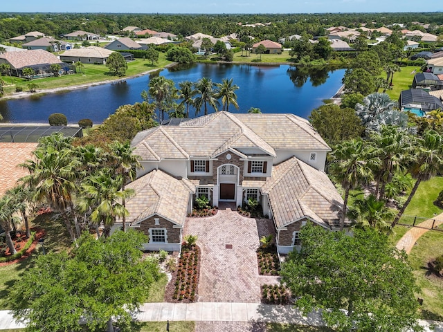 869 SW Habitat Ln, Palm City, FL 34990 - aerial perspective of suburban area featuring a large body of water
