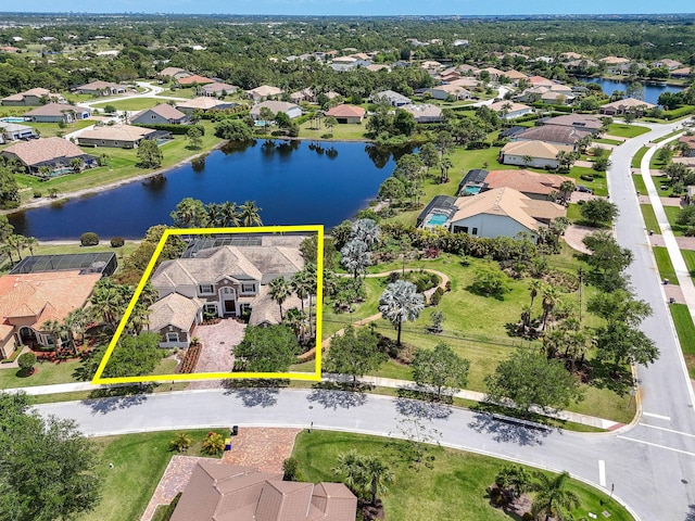 869 SW Habitat Ln, Palm City, FL 34990 - aerial view of residential area with a large body of water and property parcel outlined