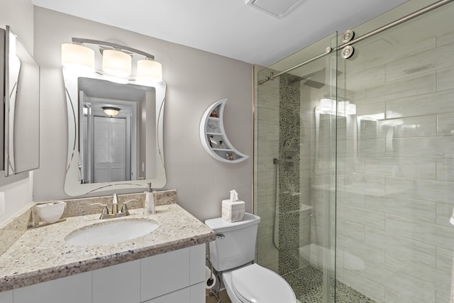213 Pine Hov Cir Unit B-1, Greenacres, FL 33463 - full bath featuring a stall shower, vanity, and toilet