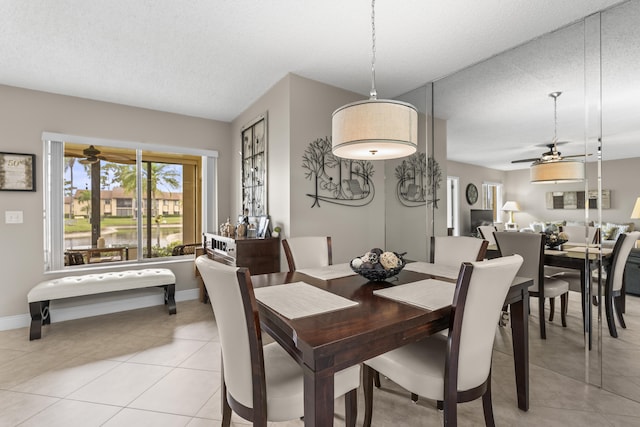 213 Pine Hov Cir Unit B-1, Greenacres, FL 33463 - dining space featuring light tile patterned flooring, baseboards, and a ceiling fan