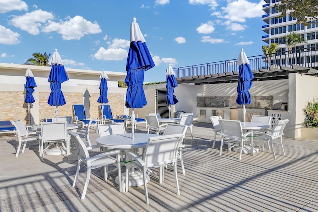 view of patio / terrace with outdoor dining space and area for grilling