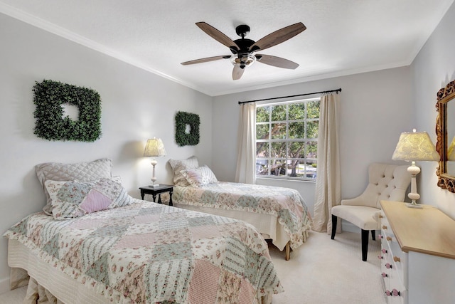 bedroom with light colored carpet, a ceiling fan, and ornamental molding