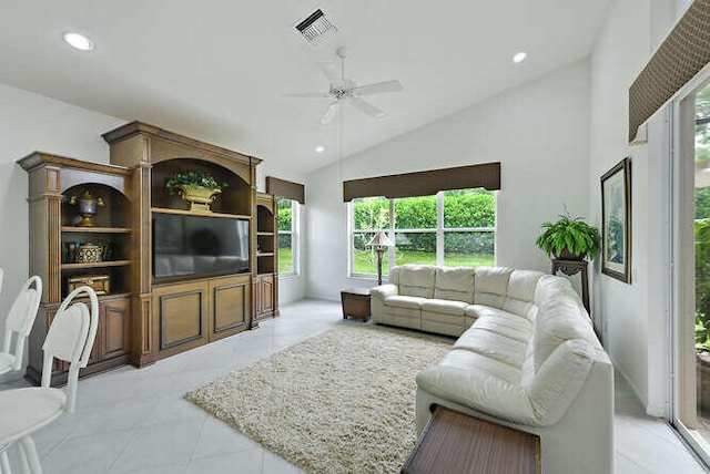 living room featuring a wealth of natural light, visible vents, a ceiling fan, and recessed lighting