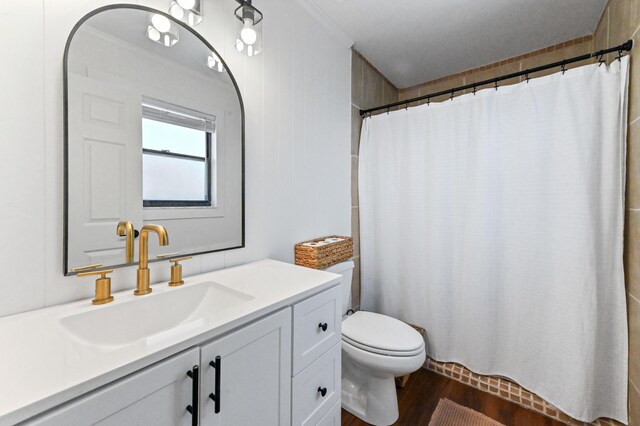 6214 Garrett St, Jupiter, FL 33458 - full bathroom featuring crown molding, vanity, toilet, wood finished floors, and a shower with curtain