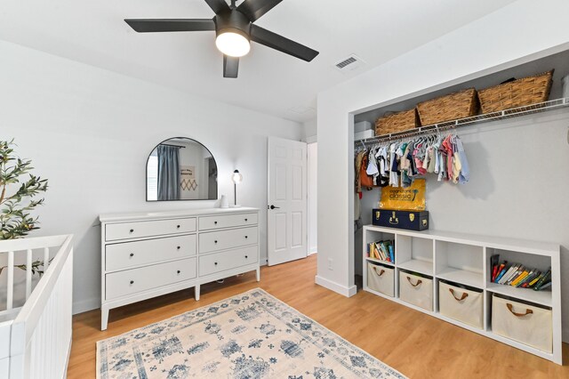 6214 Garrett St, Jupiter, FL 33458 - bedroom with ceiling fan, visible vents, baseboards, a closet, and light wood finished floors