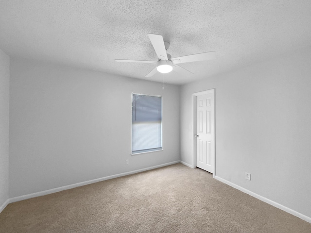 1541 SW Curry St, Port Saint Lucie, FL 34983 - carpeted empty room with ceiling fan and a textured ceiling