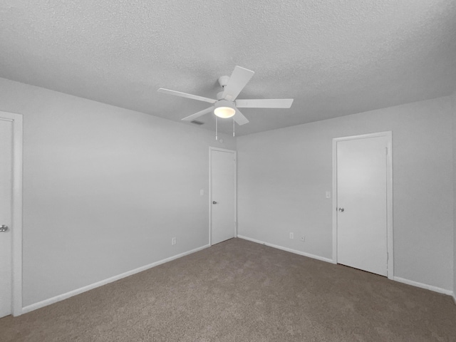 1541 SW Curry St, Port Saint Lucie, FL 34983 - empty room with a ceiling fan, carpet floors, and a textured ceiling