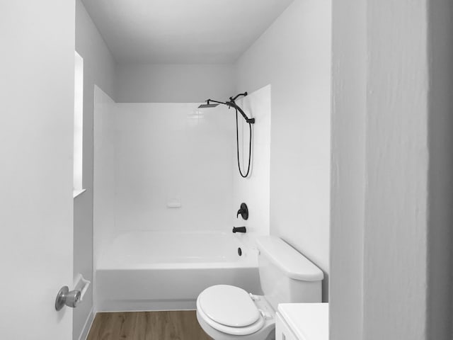 1541 SW Curry St, Port Saint Lucie, FL 34983 - bathroom with vanity, wood finished floors, and shower / bath combination