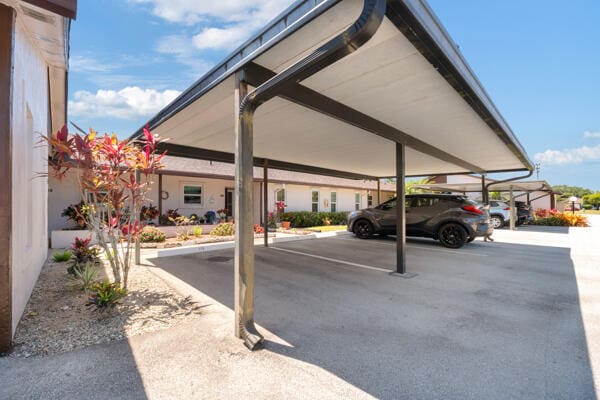 6531 SE Federal Hwy SE Unit Q108, Stuart, FL 34997 - view of covered parking lot