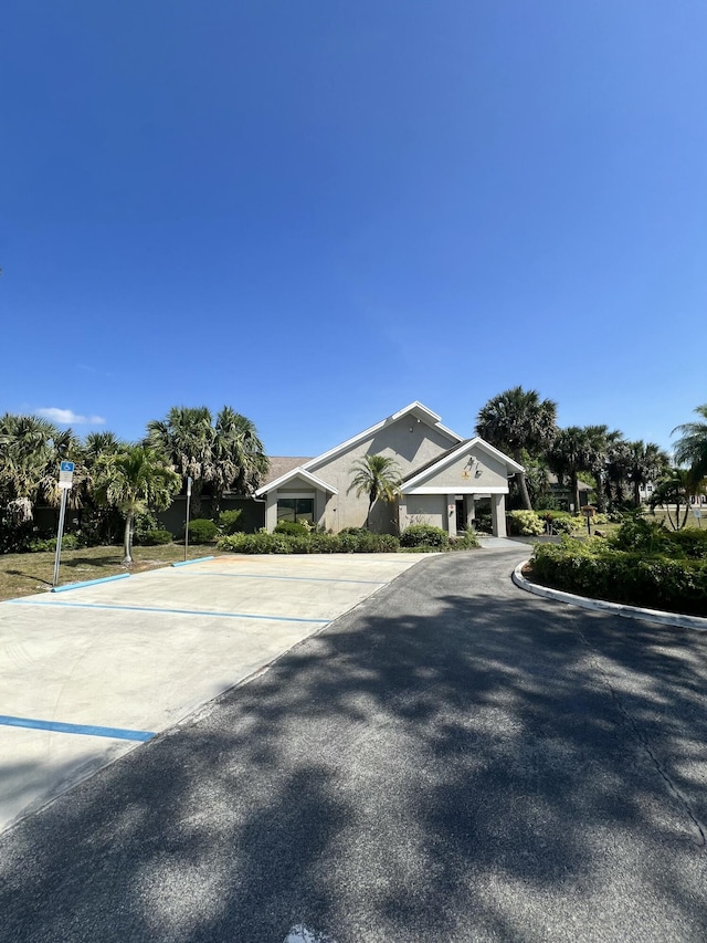 207 SW Bridgeport Dr, Port Saint Lucie, FL 34953 - view of front of house featuring stucco siding