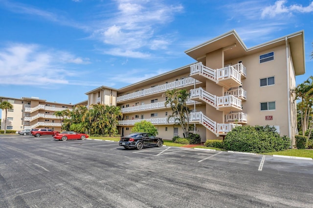 2669 S Garden Dr S Unit 401, Lake Worth, FL 33461 - view of apartment building / complex with uncovered parking