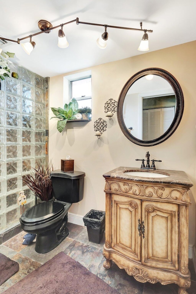 2669 S Garden Dr S Unit 401, Lake Worth, FL 33461 - bathroom featuring toilet and vanity
