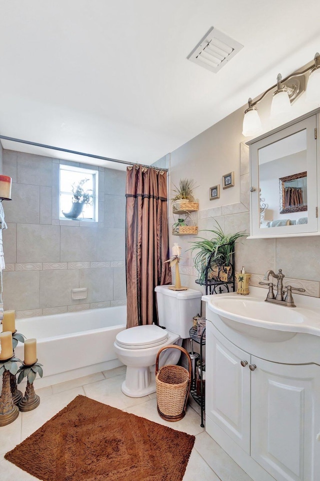 2669 S Garden Dr S Unit 401, Lake Worth, FL 33461 - full bath featuring toilet, shower / bathtub combination with curtain, tile patterned floors, and vanity