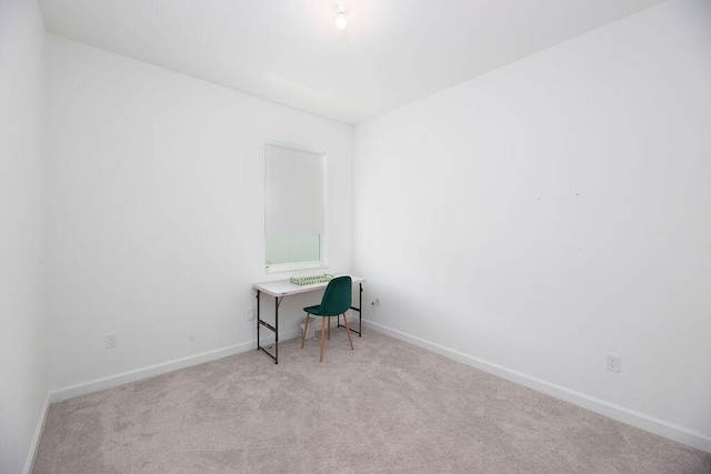 7568 NW Deysbrook Ln, Port Saint Lucie, FL 34987 - unfurnished office featuring baseboards and carpet floors
