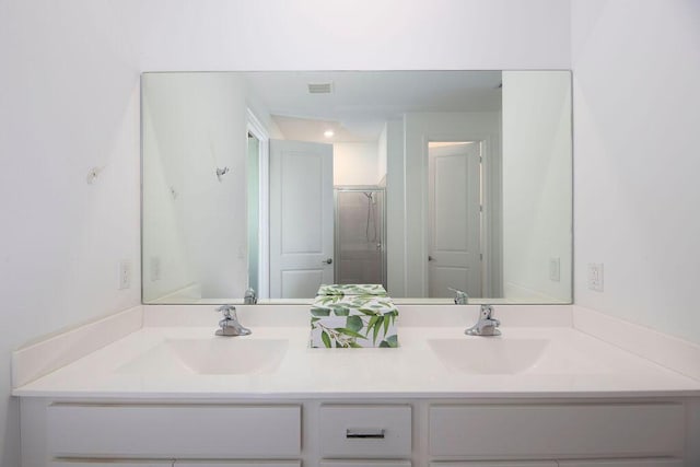 7568 NW Deysbrook Ln, Port Saint Lucie, FL 34987 - full bathroom featuring double vanity, visible vents, and a sink