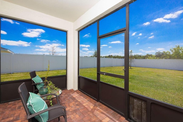 7568 NW Deysbrook Ln, Port Saint Lucie, FL 34987 - sunroom featuring brick patterned floor