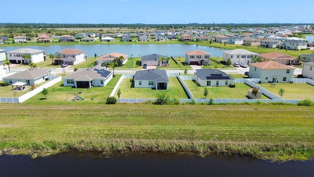 7568 NW Deysbrook Ln, Port Saint Lucie, FL 34987 - drone / aerial view with a residential view and a water view