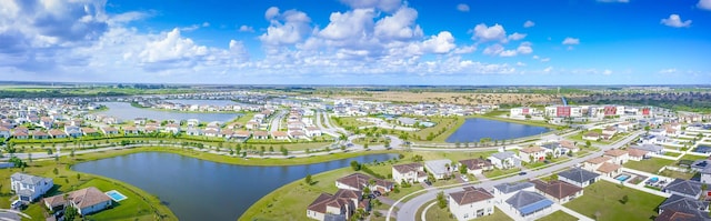7568 NW Deysbrook Ln, Port Saint Lucie, FL 34987 - drone / aerial view with a residential view and a water view