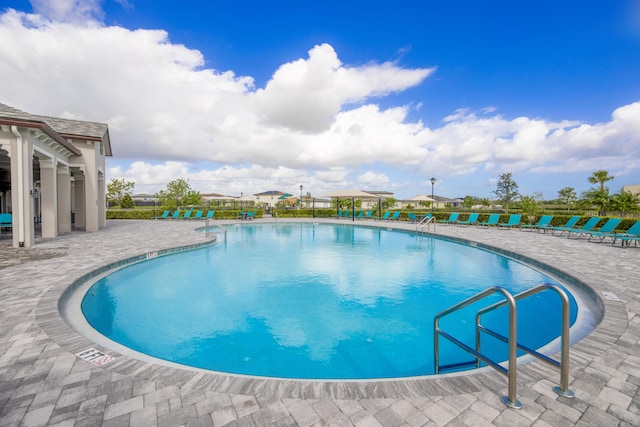 7568 NW Deysbrook Ln, Port Saint Lucie, FL 34987 - pool featuring a patio