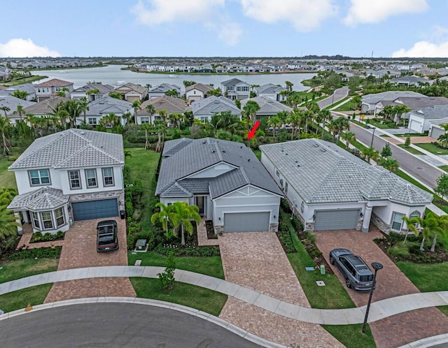 12408 Banner Ct, Palm Beach Gardens, FL 33412 - aerial perspective of suburban area with a nearby body of water