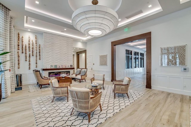 12408 Banner Ct, Palm Beach Gardens, FL 33412 - building lobby featuring a decorative wall, recessed lighting, and wainscoting
