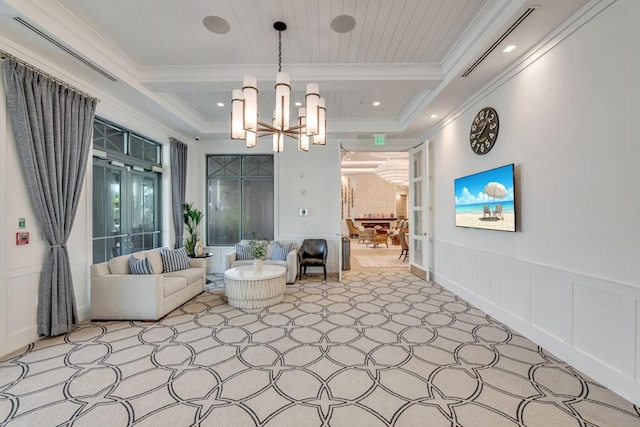 12408 Banner Ct, Palm Beach Gardens, FL 33412 - living area with carpet, a decorative wall, a chandelier, ornamental molding, and coffered ceiling
