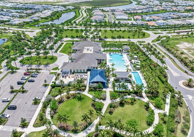 12408 Banner Ct, Palm Beach Gardens, FL 33412 - aerial view of property's location featuring a large body of water, a pool, and nearby suburban area